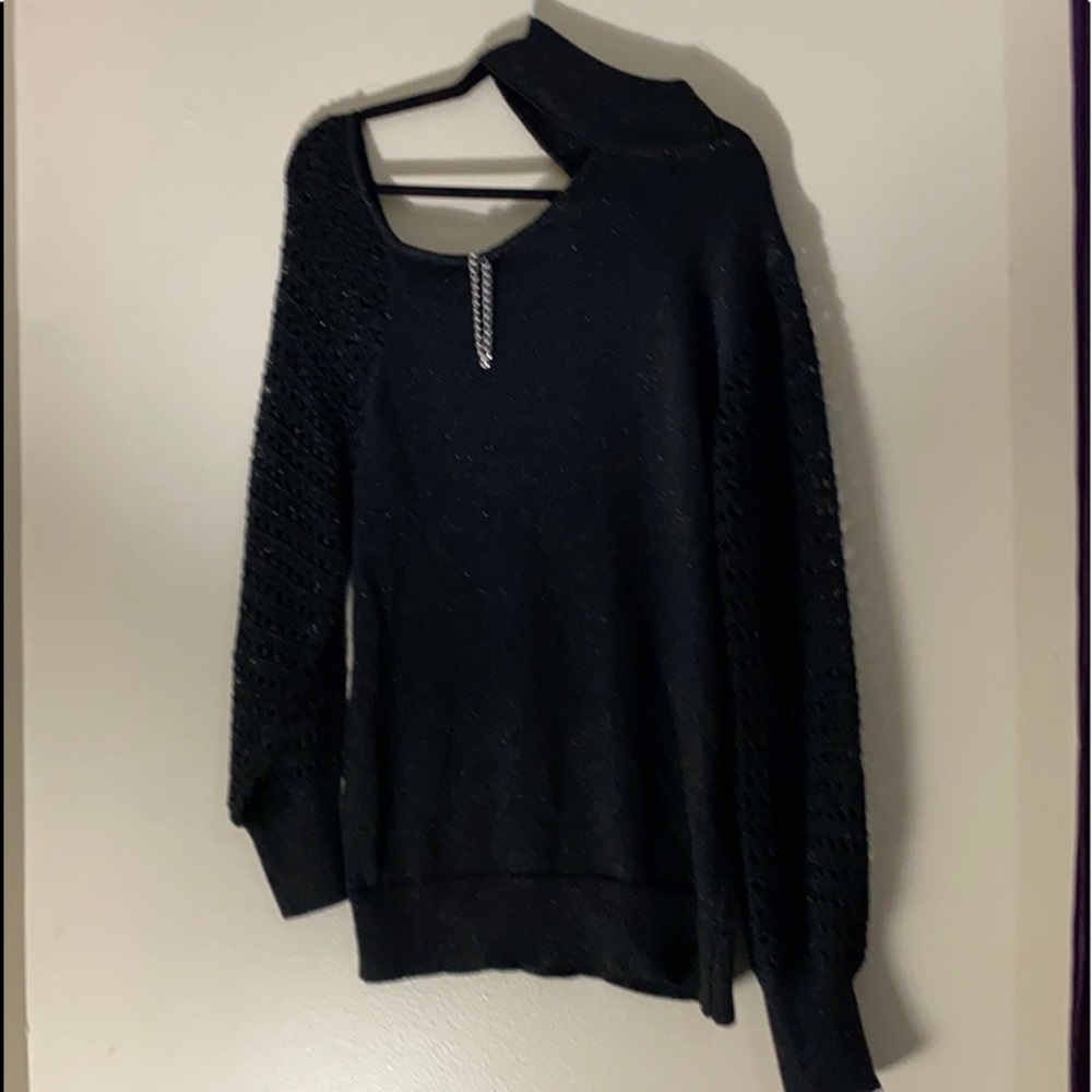 Sweater with opening